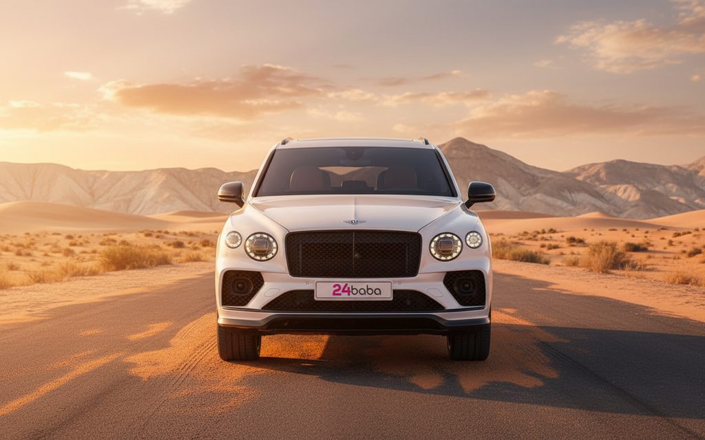 Bentley Bentayga 2023 White front view with headlights – rental in Dubai