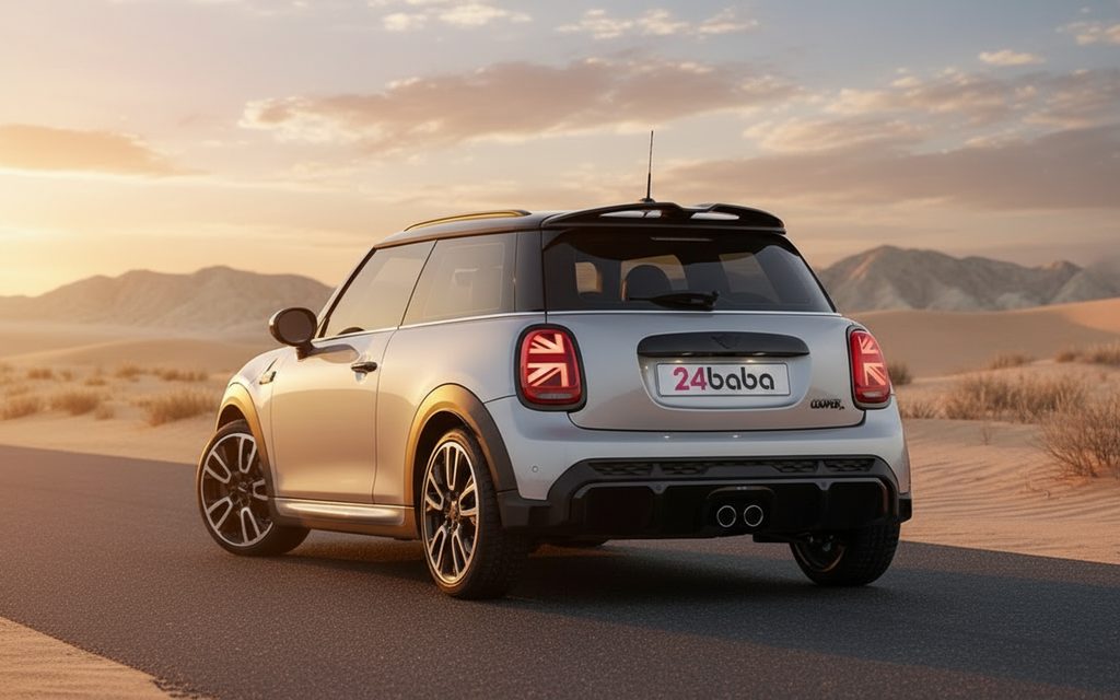 Mini Cooper 2024 Silver rear view showing taillights – rental in Dubai