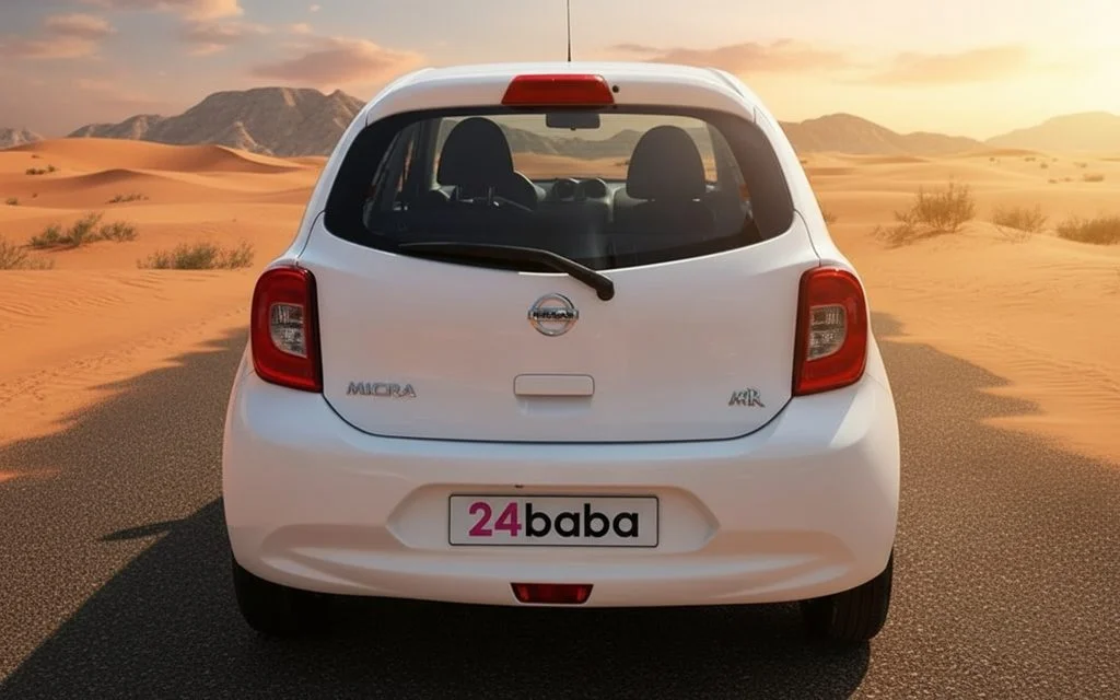 Nissan Micra 2020 White rear view showing taillights – rental in Dubai
