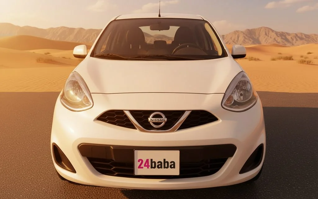 Nissan Micra 2020 White front view with headlights – rental in Dubai