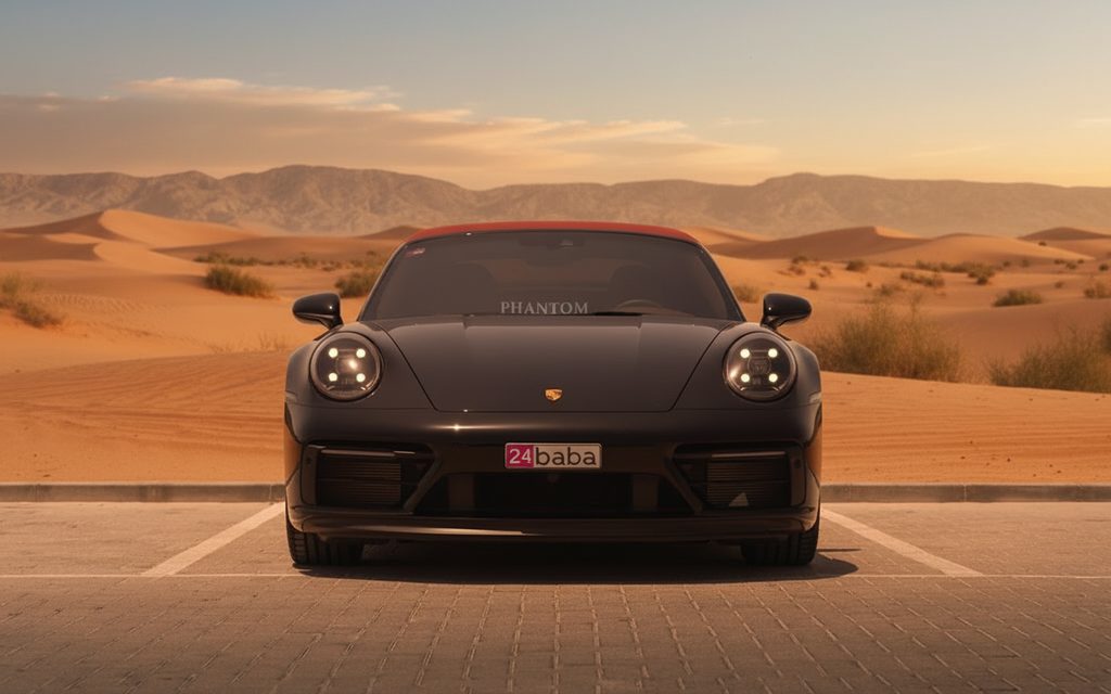 Porsche 911 2023 Black front view with headlights – rental in Dubai