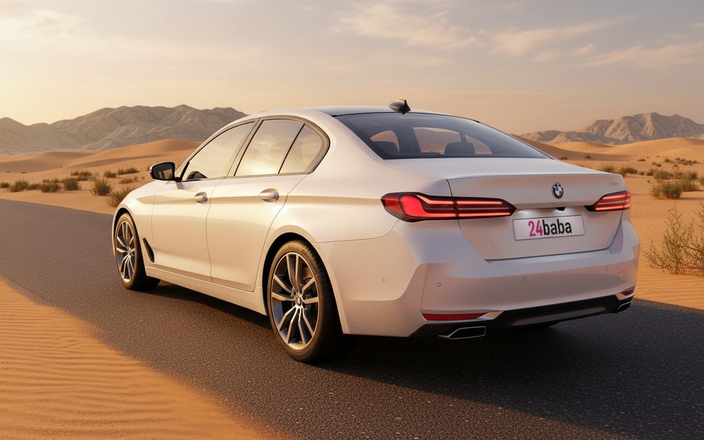 Bmw 520 2024 White rear view showing taillights – rental in Dubai
