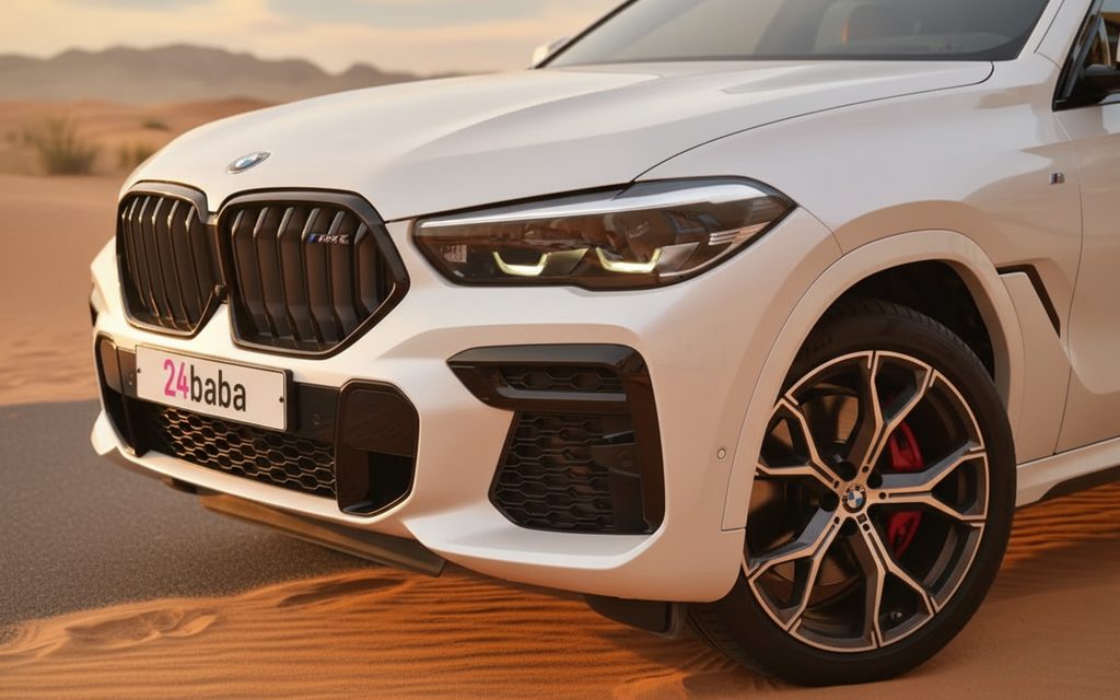 Bmw X6 2024 White front view with headlights – rental in Dubai