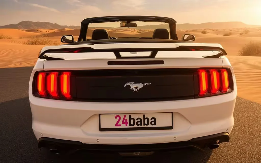 Ford Mustang 2023 White rear view showing taillights – rental in Dubai