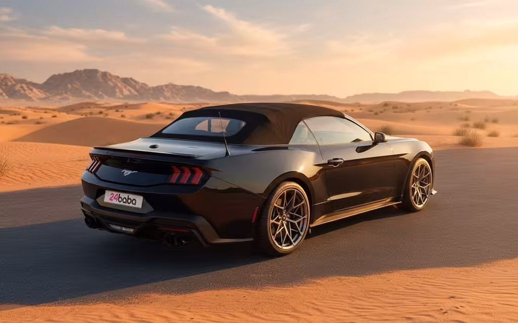 Ford Mustang 2024 Black rear view showing taillights – rental in Dubai