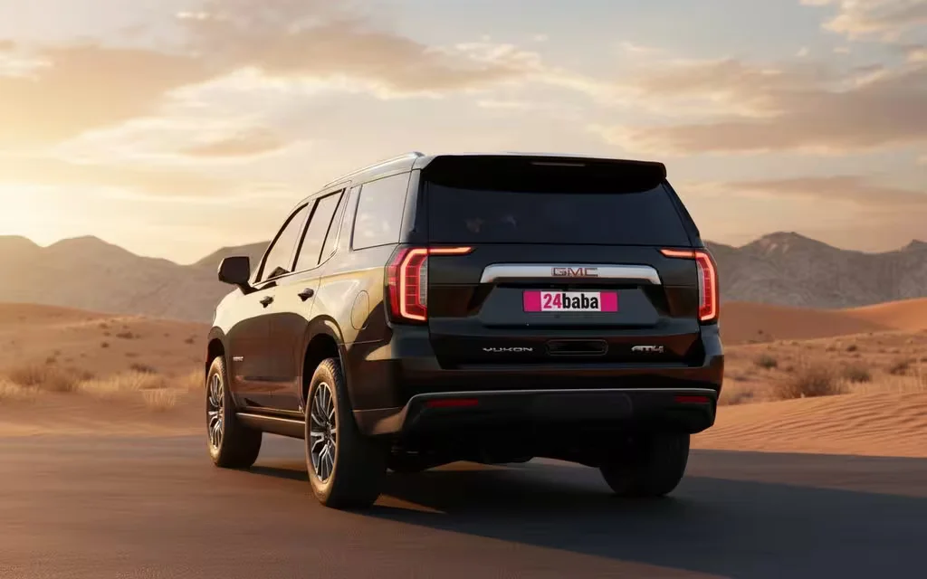 Gmc Yukon 2024 Black rear view showing taillights – rental in Dubai