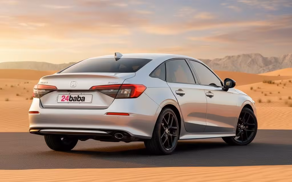 Honda Civic 2024 Silver rear view showing taillights – rental in Dubai