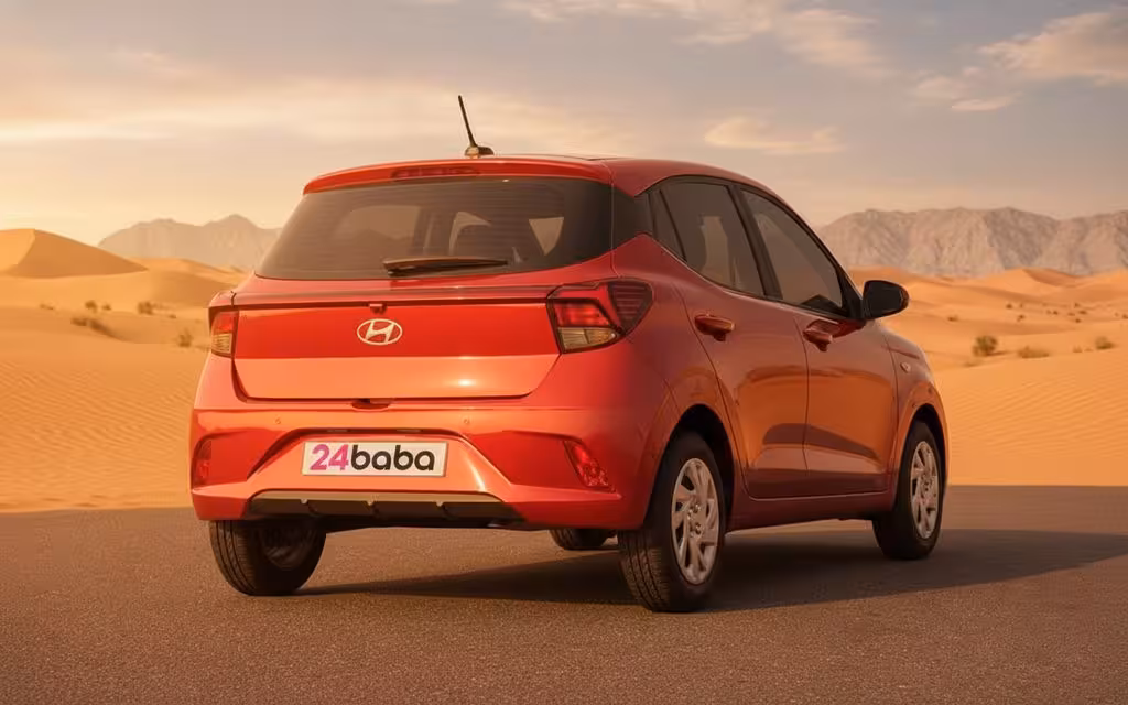 Hyundai GrandI10 2023 Red rear view showing taillights – rental in Dubai