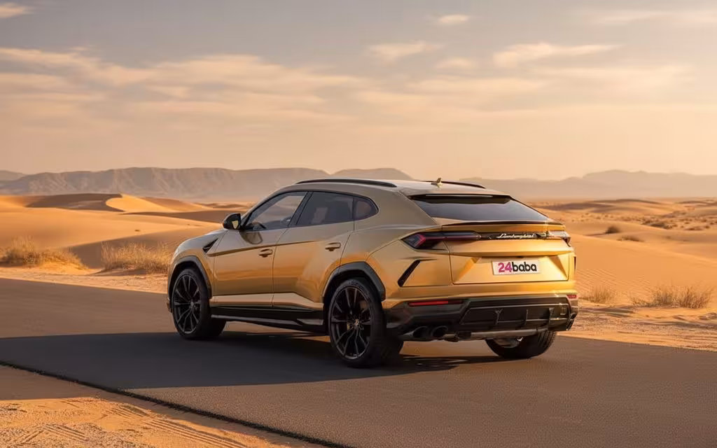 Lamborghini Urus 2022 Gold parked outdoor scene – rental in Dubai