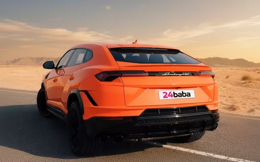 Lamborghini Urus 2023 Orange rear view showing taillights – rental in Dubai