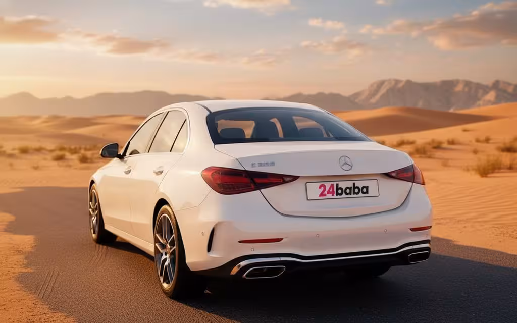 Mercedes C300 2023 White rear view showing taillights – rental in Dubai