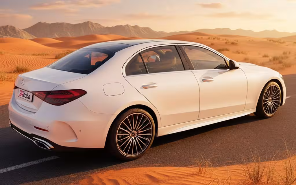 Mercedes C300 2023 White parked outdoor scene – rental in Dubai