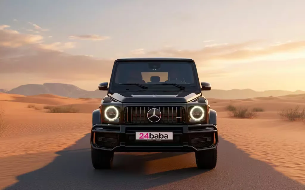 Mercedes G63 2021 Black front view with headlights – rental in Dubai