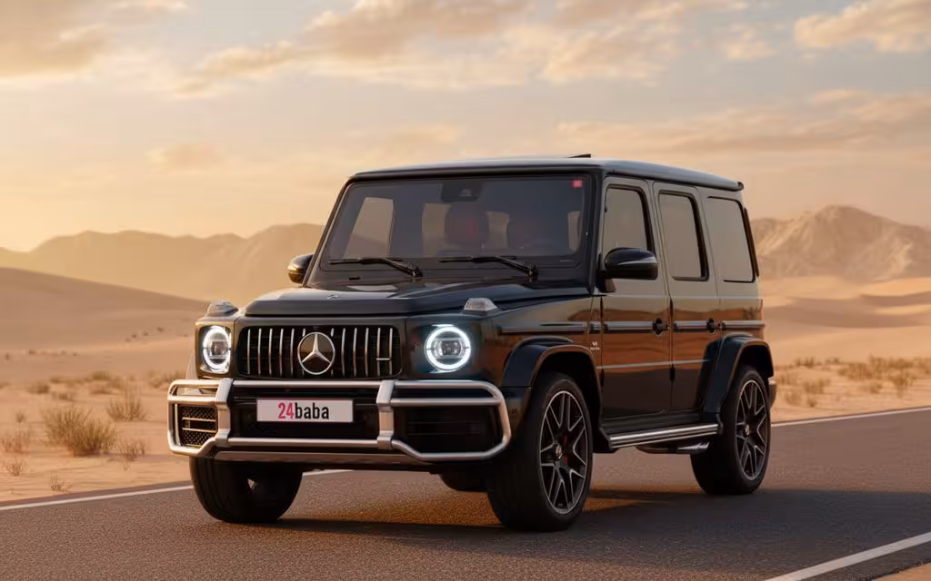 Mercedes G63 2022 Black front view with headlights – rental in Dubai