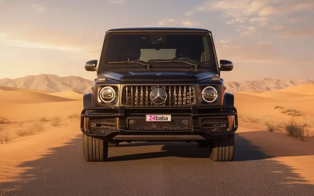 Mercedes G63 2023 Black front view with headlights – rental in Dubai