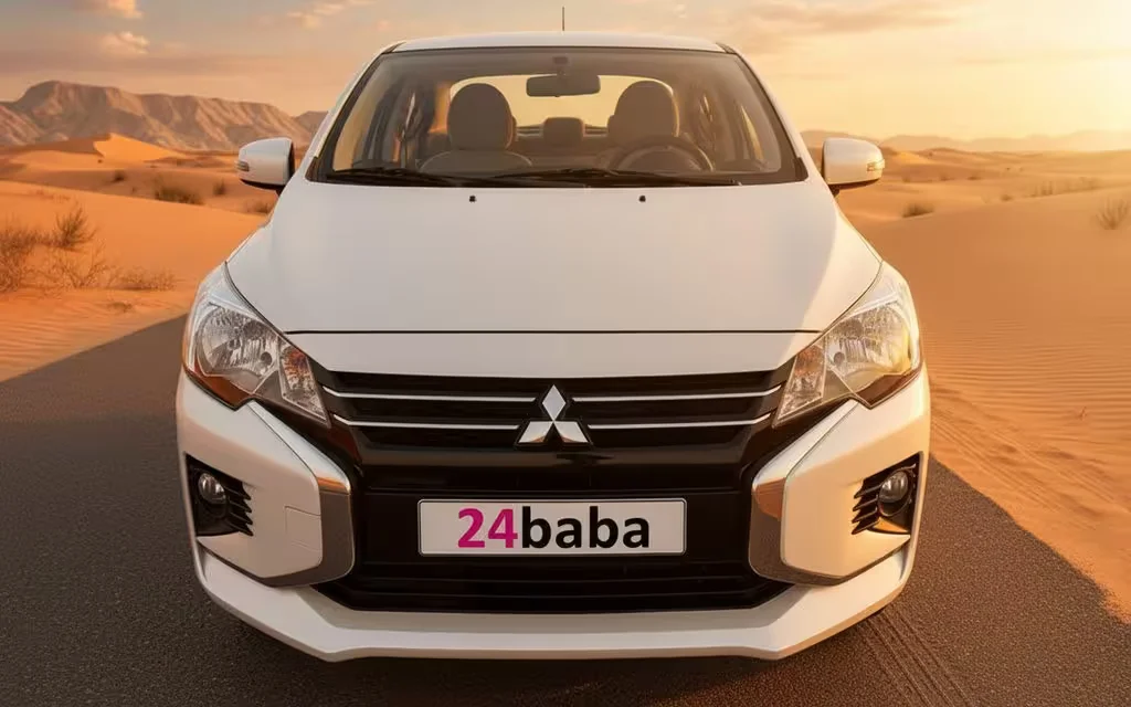 Mitsubishi Attrage 2025 White front view with headlights – rental in Dubai