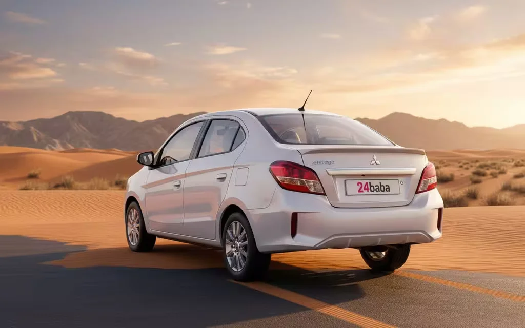 Mitsubishi Attrage 2025 White rear view showing taillights – rental in Dubai