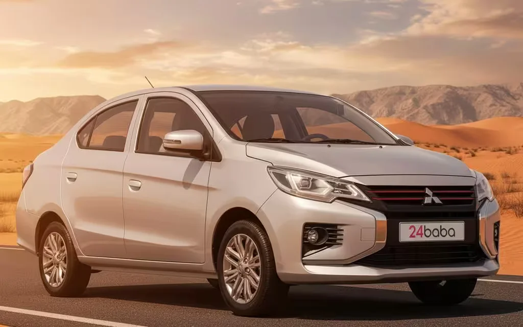 Mitsubishi Attrage 2025 Silver front view with headlights – rental in Dubai