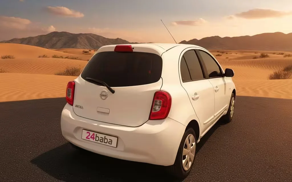 Nissan Micra 2020 White rear view showing taillights – rental in Dubai