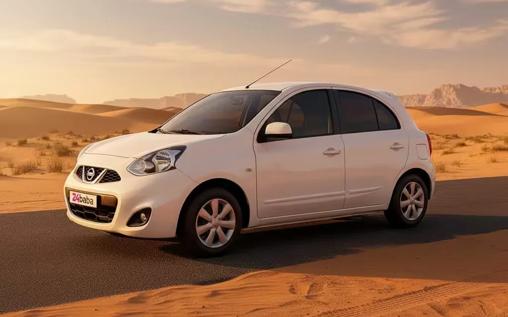 Nissan Micra 2020 White side profile – rental in Dubai