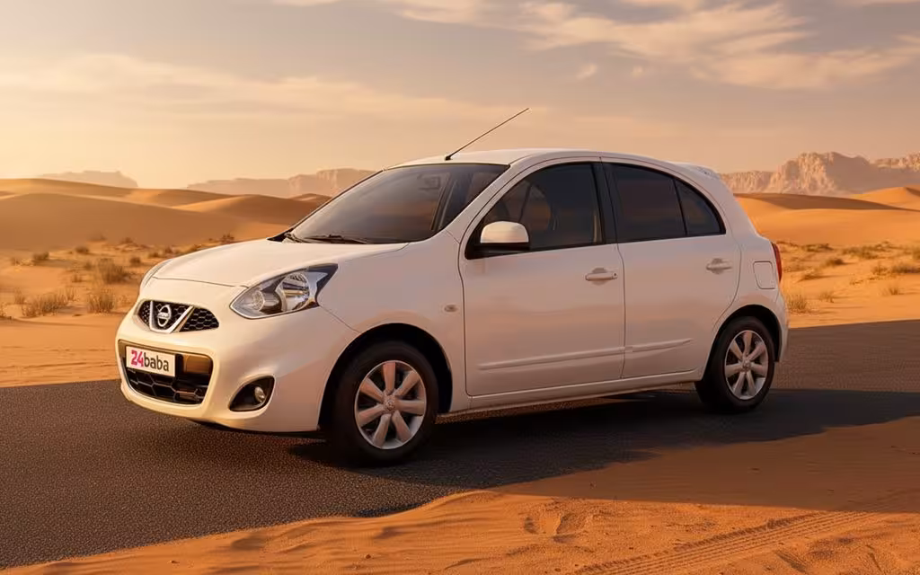 Nissan Micra 2020 White side profile – rental in Dubai