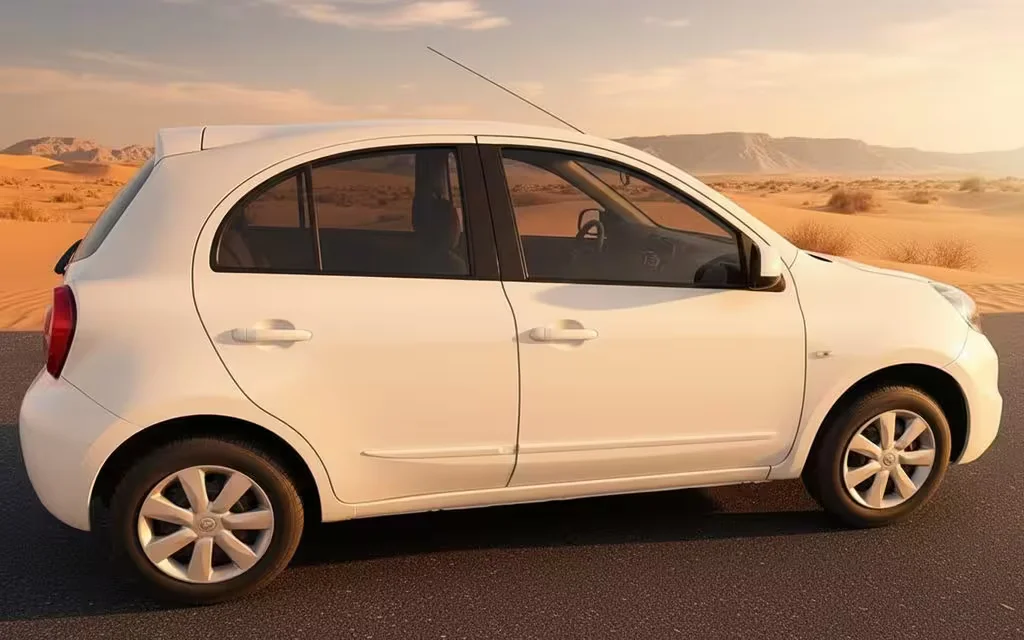 Nissan Micra 2020 White side profile – rental in Dubai