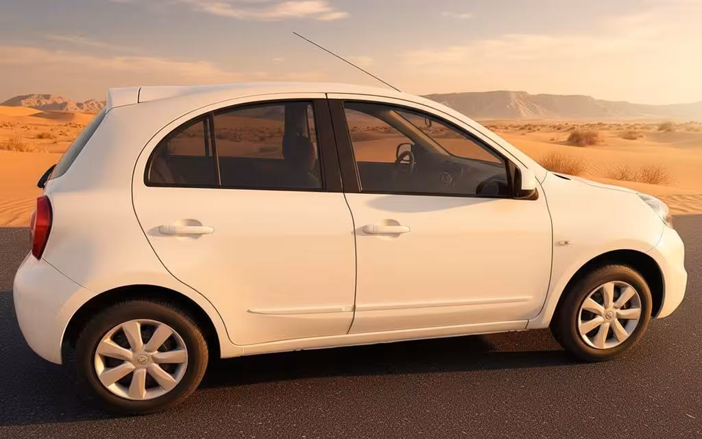 Nissan Micra 2020 White side profile – rental in Dubai