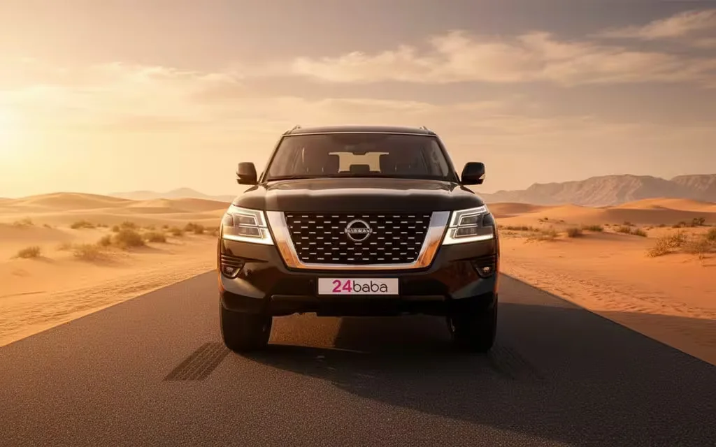 Nissan Patrol 2022 Black front view with headlights – rental in Dubai