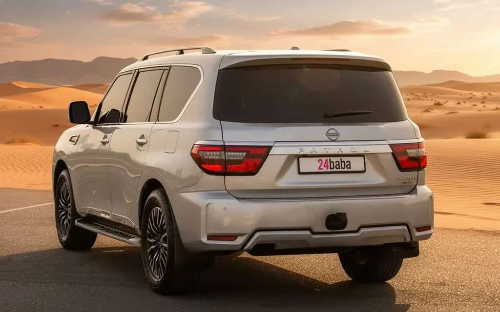 Nissan Patrol 2023 Silver rear view showing taillights – rental in Dubai