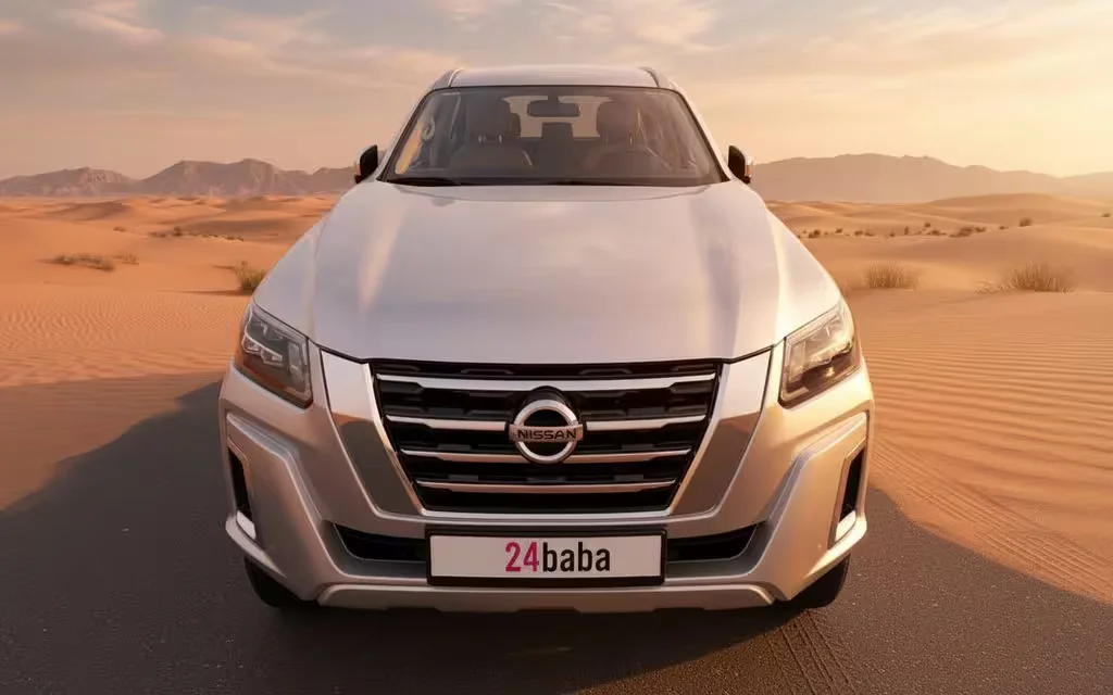 Nissan X Terra 2023 Silver front view with headlights – rental in Dubai