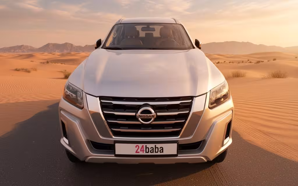 Nissan X Terra 2023 Silver front view with headlights – rental in Dubai