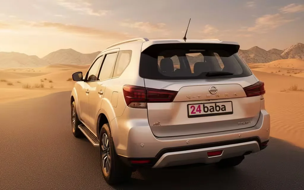 Nissan X Terra 2023 Silver rear view showing taillights – rental in Dubai