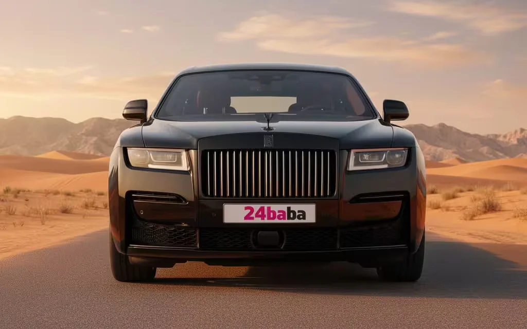 RollsRoyce Ghost 2023 Black front view with headlights – rental in Dubai