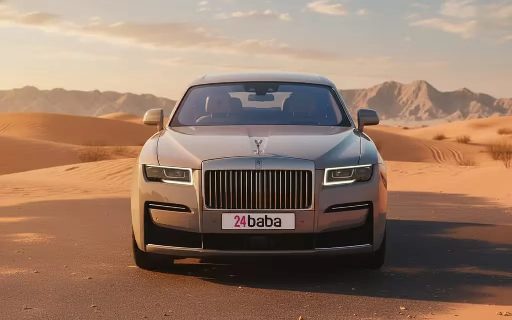 RollsRoyce Ghost 2023 Silver front view with headlights – rental in Dubai