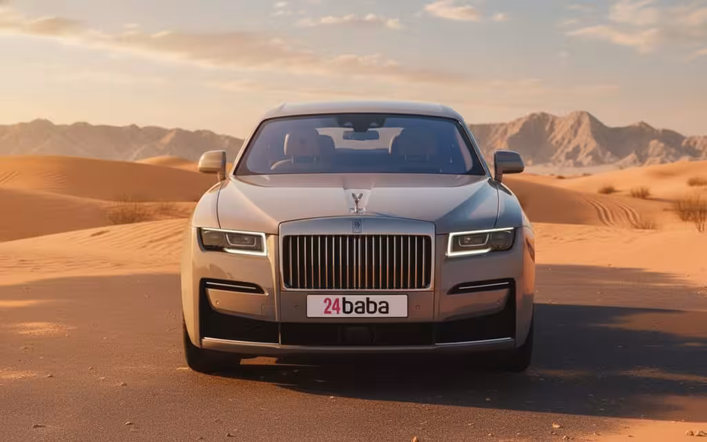RollsRoyce Ghost 2023 Silver front view with headlights – rental in Dubai
