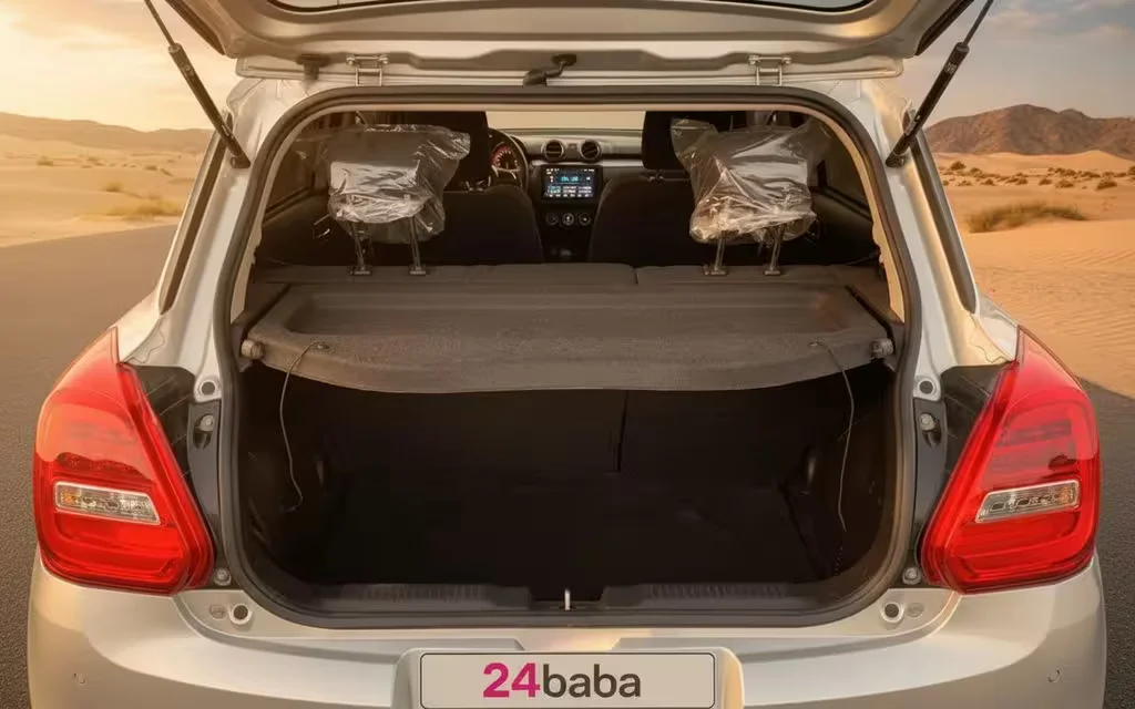 Suzuki Swift 2023 Grey rear view showing taillights – rental in Dubai