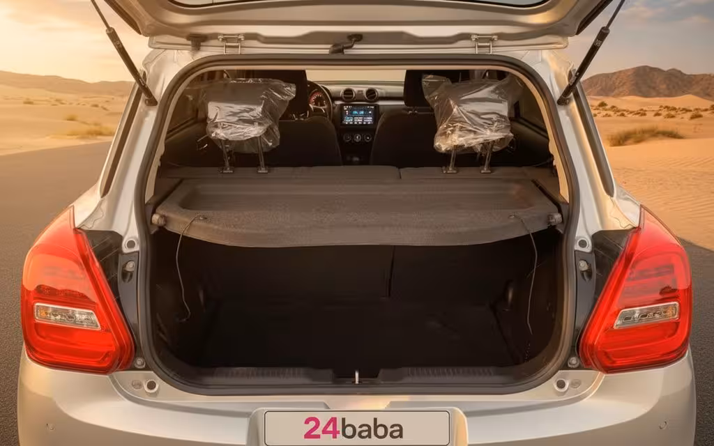 Suzuki Swift 2023 Grey rear view showing taillights – rental in Dubai