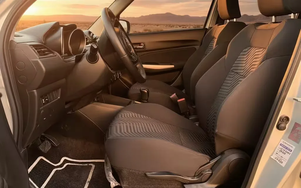 Suzuki Swift 2023 leather seats and cabin – rental in Dubai