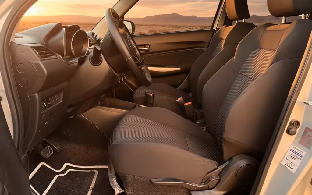 Suzuki Swift 2023 leather seats and cabin – rental in Dubai