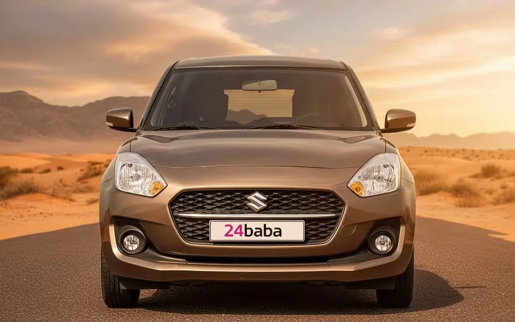 Suzuki Swift 2023 Grey front view with headlights – rental in Dubai