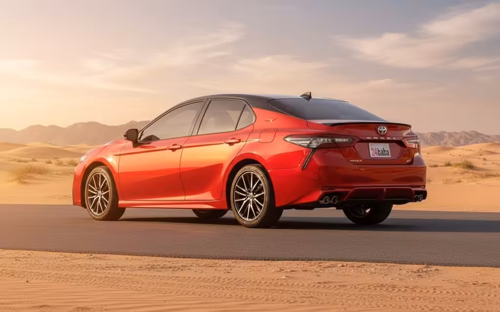 Toyota Camry 2022 Red rear view showing taillights – rental in Dubai