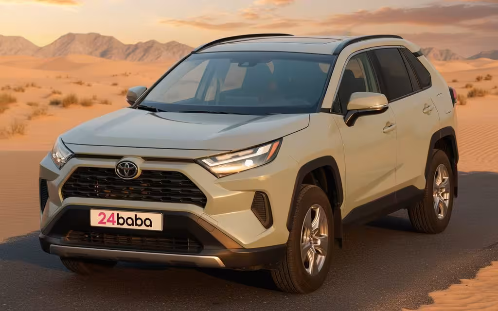 Toyota Rav4 2022 Green parked outdoor scene – rental in Dubai